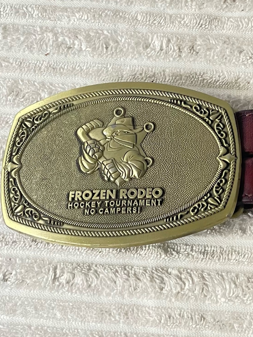 Vintage Frozen Rodeo Hockey Tournament buckle & Brown Braided Leather Concho
